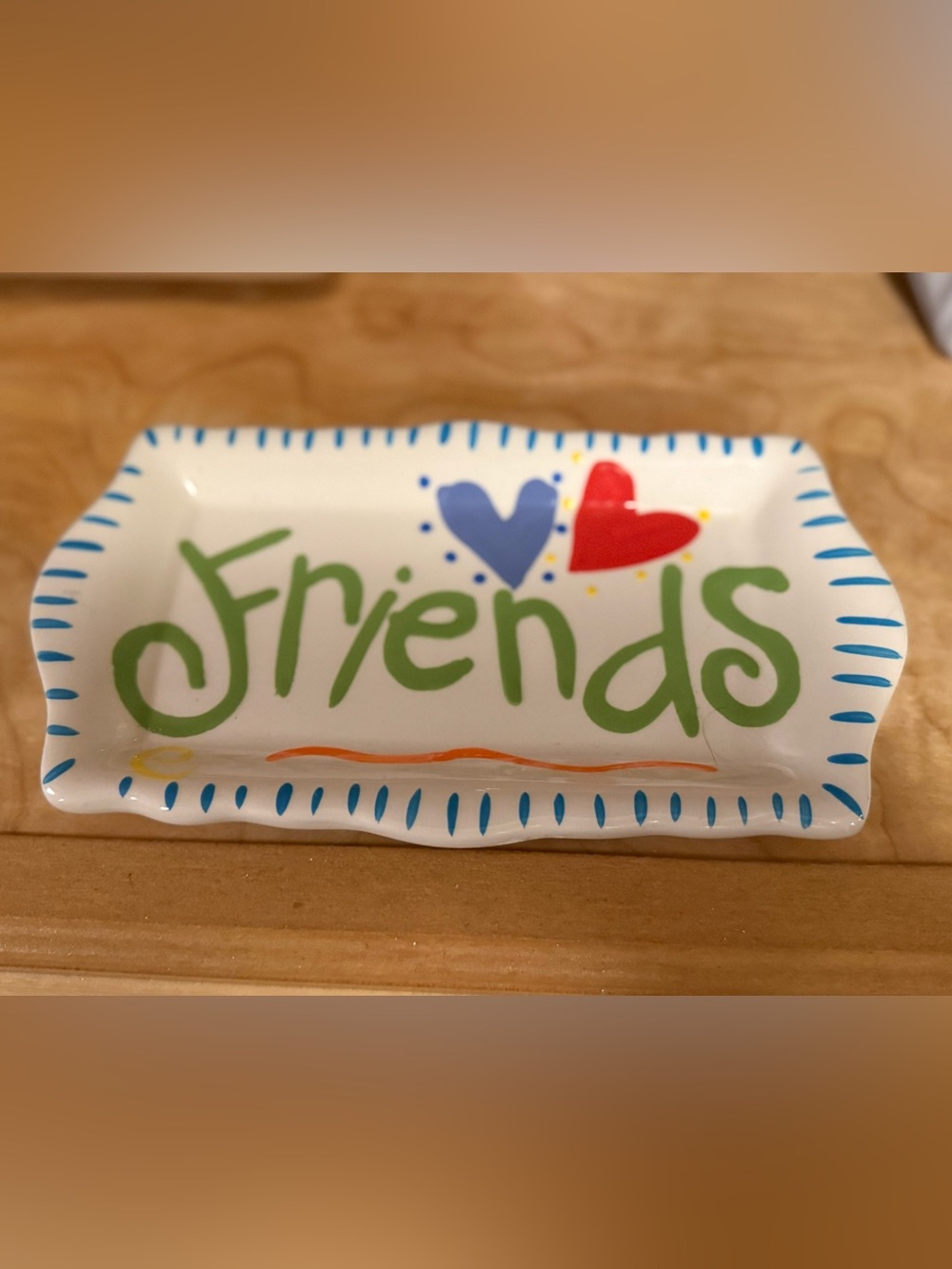 Ceramic trinket tray by Coton Colors Express that says Friends